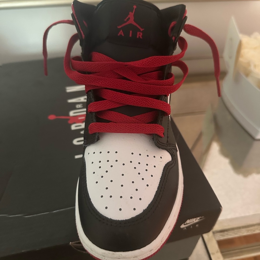 Air Jordan 11 Retro White and Black Sneakers